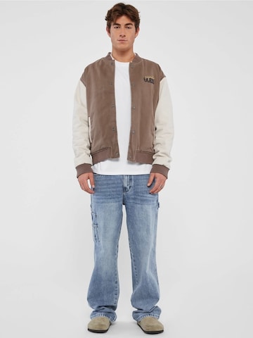 GUESS Between-Season Jacket in Beige