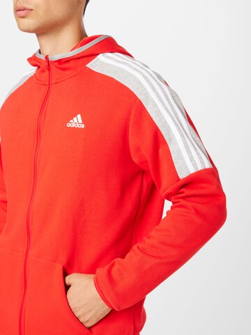 ADIDAS SPORTSWEAR - Fato de treino 'Fleece Colorblock' em vermelho