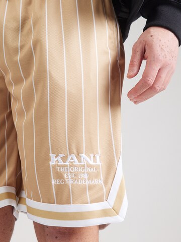 Loosefit Pantalon Karl Kani en beige