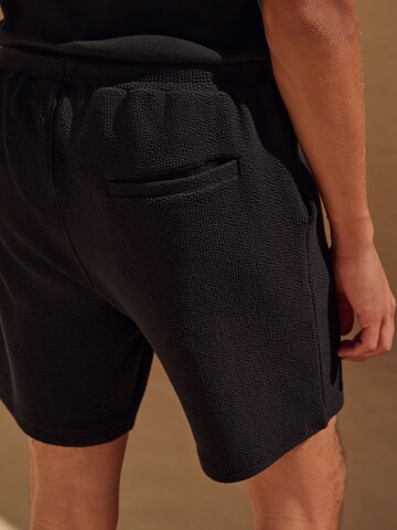 regular Pantaloni di Next in nero