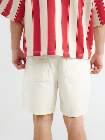 BALMOHK Loosefit Housut värissä beige