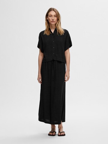 SELECTED Rok in Zwart