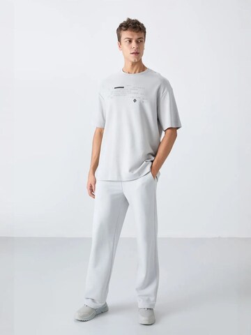 Tommy Life - Camisa 'T-Shirts' em cinzento
