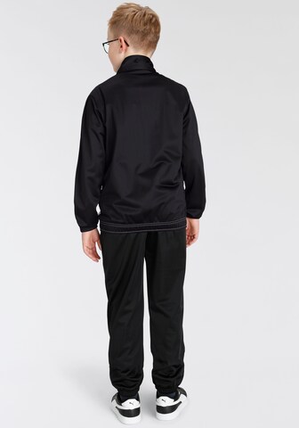 Champion Authentic Athletic Apparel Tracksuit in Black