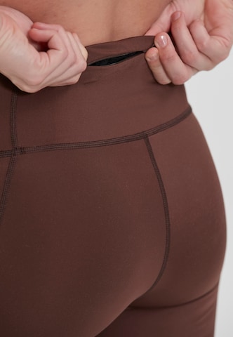 ENDURANCE Skinny Spodnie sportowe 'Thadea' w kolorze brązowy