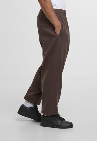 Tapered Pantaloni 'Signature Essential' di Karl Kani in marrone