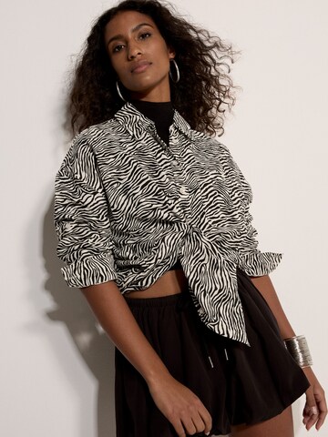 Chemisier ' ' Apricot en noir