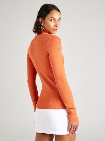 Calvin Klein Jeans Pulover | oranžna barva