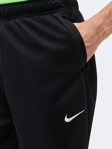 NIKE regular Παντελόνι φόρμας 'FLEX' σε μαύρο
