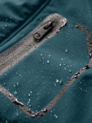 Next - Chaqueta funcional en azul