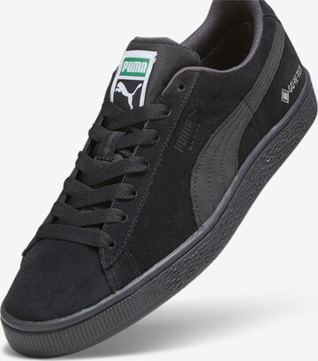 Baskets basses PUMA en noir