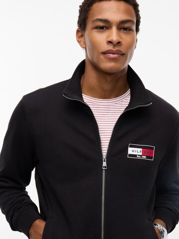 Veste de survêtement 'BRAND LOVE' TOMMY HILFIGER en noir