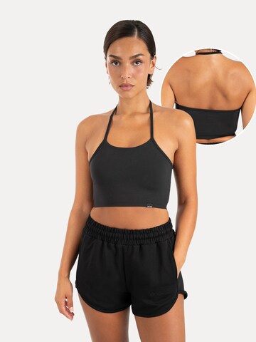 Haut de sport ' Florea ' Smilodox en noir : devant