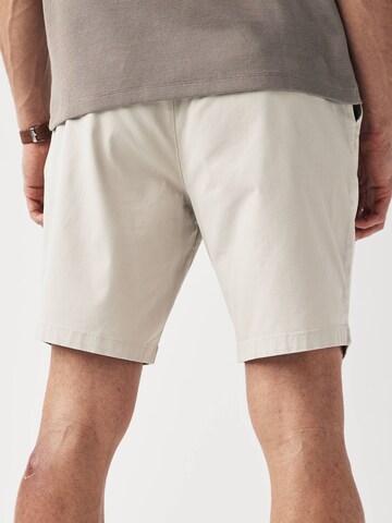 regular Pantaloni chino di Next in beige