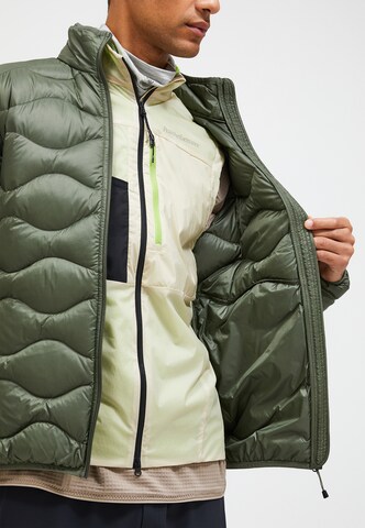 PEAK PERFORMANCE Daunenjacke in Grün
