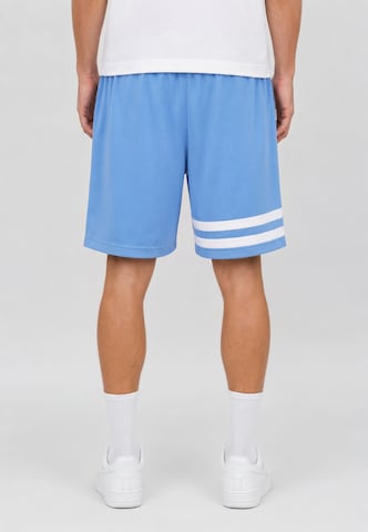 Unfair Athletics Regular Trousers 'DMWU' in Blue