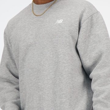 new balance - Sweatshirt 'Sport Essentials Fleece Crew' em cinzento