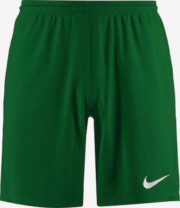 NIKE Workout Pants in Green: front