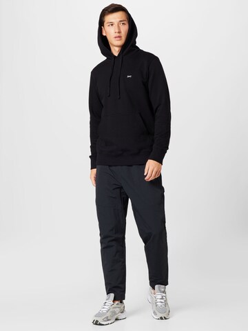 Nike Sportswear Tapered Pants in Black