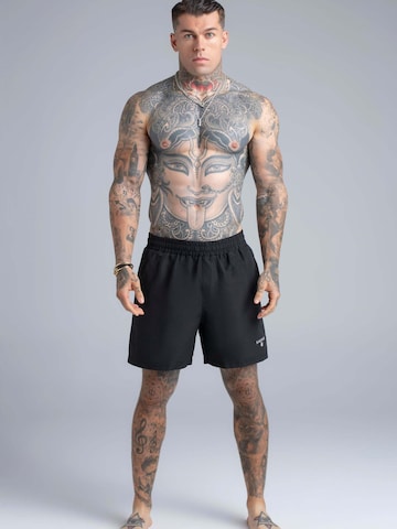 Shorts de bain SikSilk en noir : devant