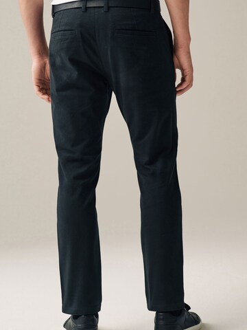 Slimfit Pantaloni chino di Next in nero