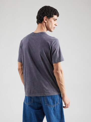 Maglietta di Champion Authentic Athletic Apparel in lilla