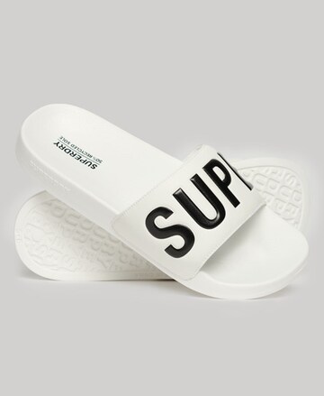 Claquettes / Tongs Superdry en blanc