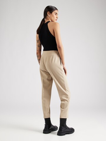 Effilé Pantalon à plis Marks & Spencer en beige