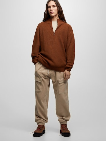 Pull&Bear Tapered Cargo trousers in Beige: front