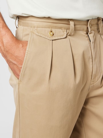 Polo Ralph Lauren Regular Pleat-front trousers 'WHITMANCHINO' in Beige