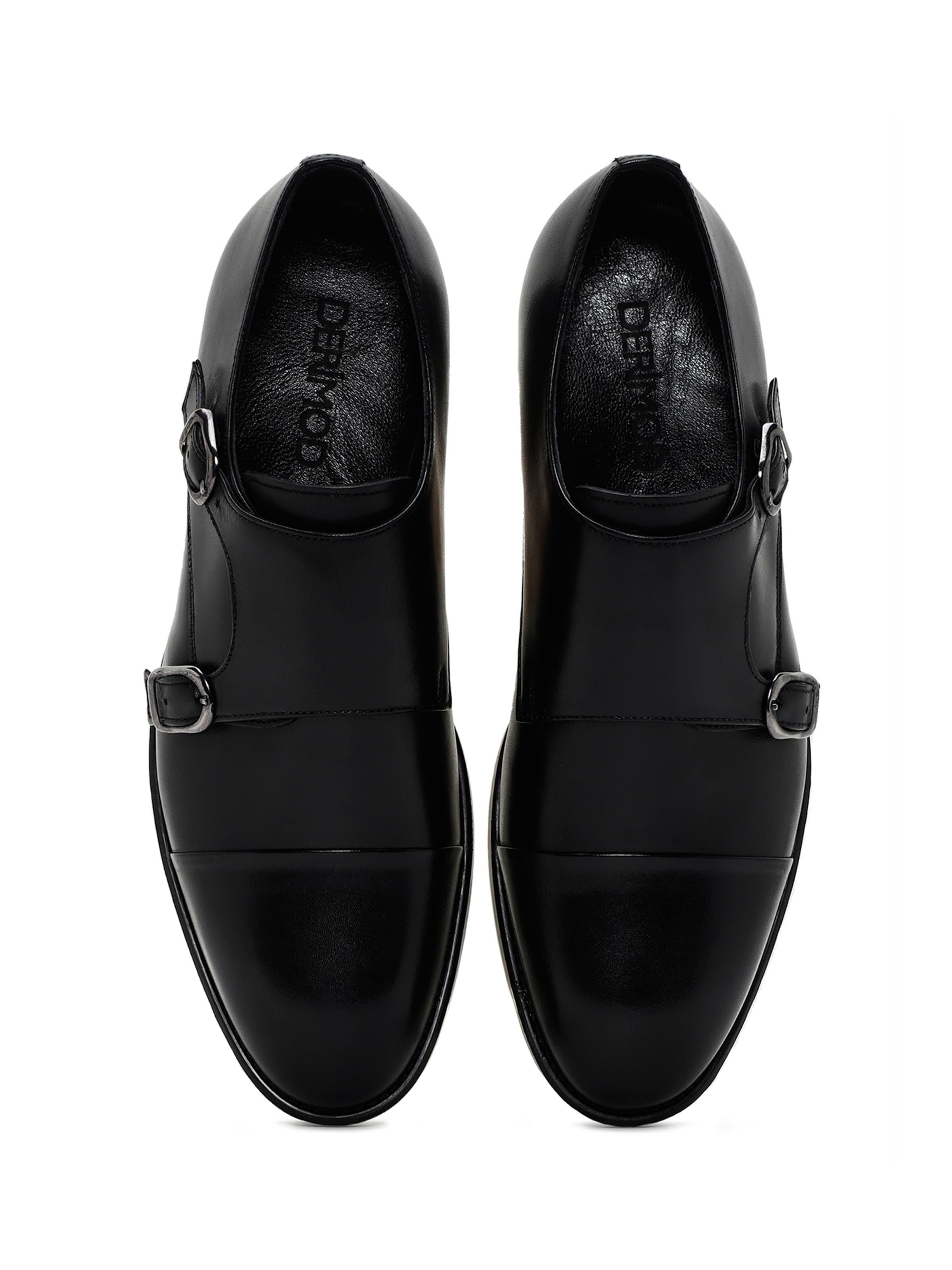 Slipper di Derimod in nero