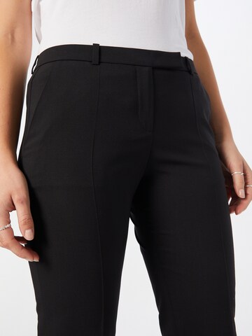 Coupe slim Pantalon à plis HUGO en noir