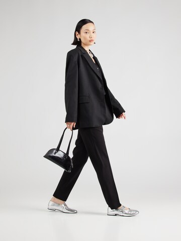 regular Pantaloni con piega frontale 'Tiluna' di BOSS in nero