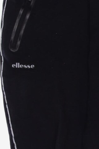 ELLESSE Pants in 31-32 in Black