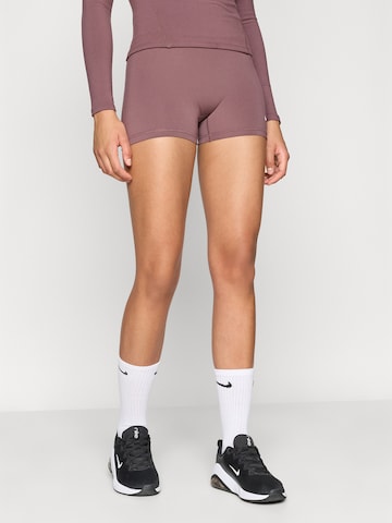 NIKE Skinny Workout Pants '365' in Purple: front