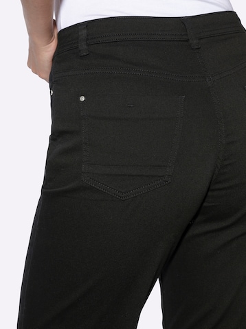 heine - Slimfit Calças de ganga em preto