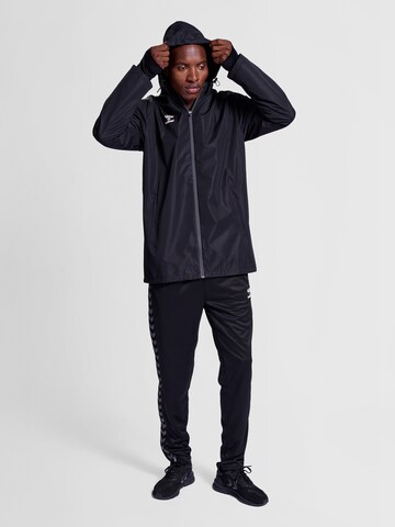 Veste de sport Hummel en noir