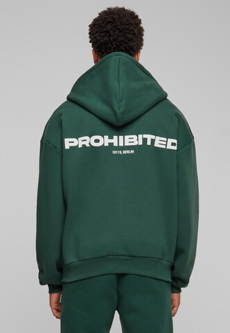 Prohibited Zip-Up Hoodie in Green: front