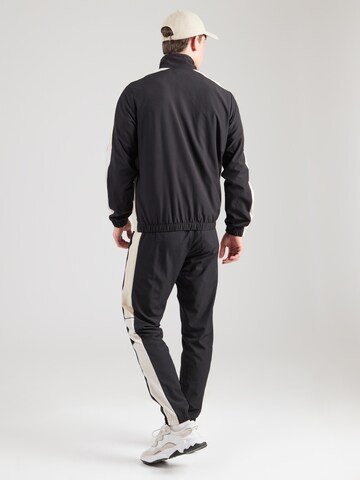 Completo per l'allenamento 'Alata' di Sergio Tacchini in nero