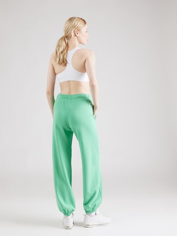 Effilé Pantalon 'AIR' Nike Sportswear en vert