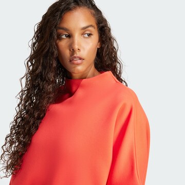 Felpa 'Neuclassics' di ADIDAS ORIGINALS in arancione