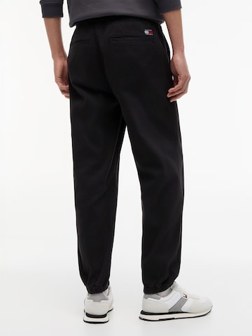 Tommy Jeans Tapered Byxa 'SONNY' i svart