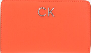 Porte-monnaies Calvin Klein en orange : devant