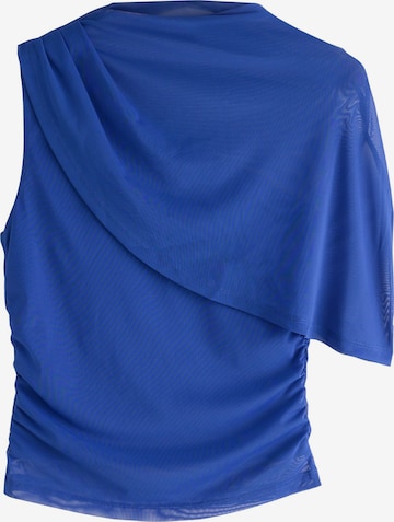 Next - Top en azul: frente