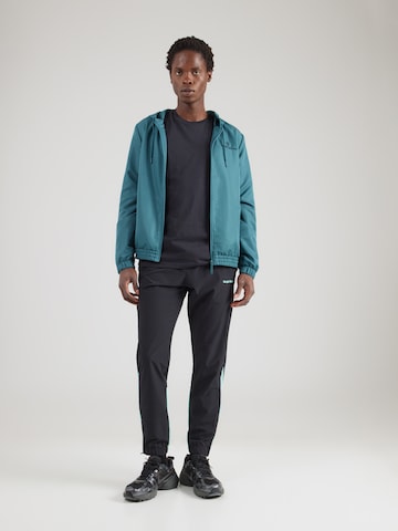 Effilé Pantalon 'Arcata' Sergio Tacchini en noir