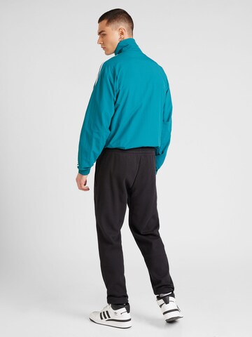 Regular Pantalon 'ESS' ADIDAS ORIGINALS en noir