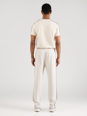 ELLESSE - Regular Calças 'Inzagi' em bege