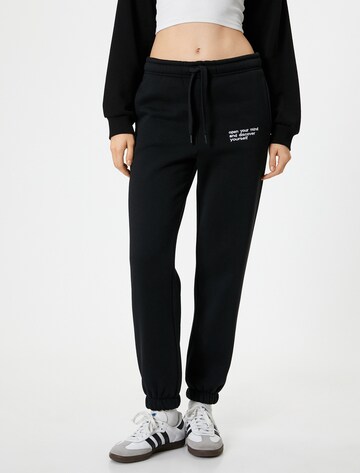 Koton Tapered Pants in Black: front