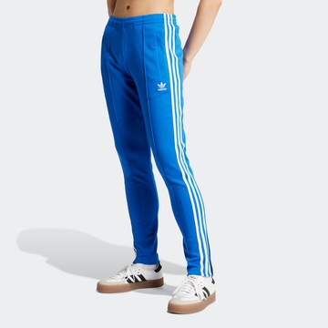 ADIDAS ORIGINALS Slim fit Trousers 'Adicolor SST' in Blue: front