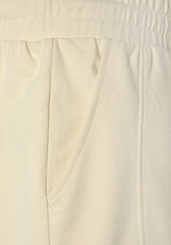 FCUK Szeroka nogawka Spodnie w kolorze beżowy